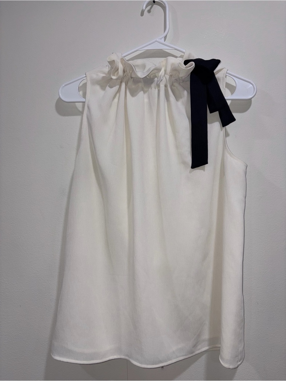 Ann Taylor Cream Ruffle-Neck Sleeveless Blouse with Black Bow